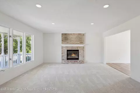 Living - 12341 Burlingame Dr, Dewitt, MI 48820 photo 2 of 4