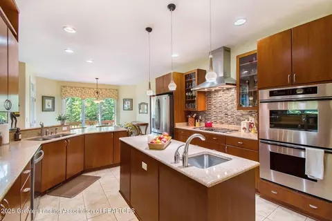 Kitchen - 10696 W Clark Rd, Eagle, MI 48822 photo 4 of 7