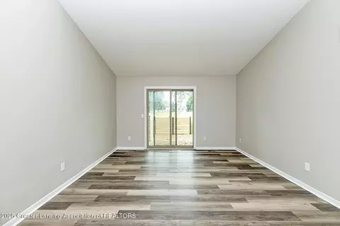 Living - 5916 Okemos Rd, Haslett, MI 48840 photo 2 of 4