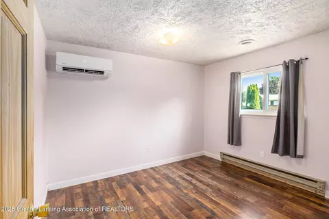 Bedroom - 309 Valley Ct, Perry, MI 48872 photo 2 of 2