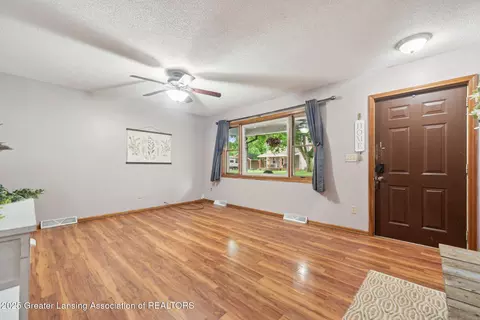 Living - 445 S Oak St, Maple Rapids, MI 48853 photo 2 of 2