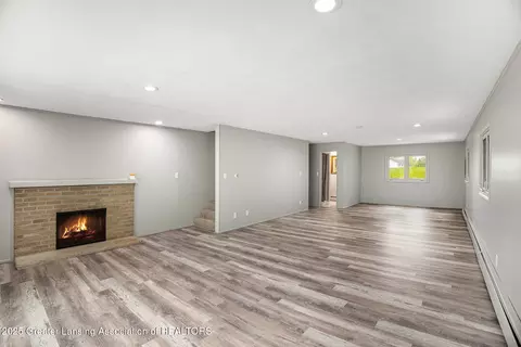 Living - 11958 Eden Trl, Eagle, MI 48822 photo 5 of 7