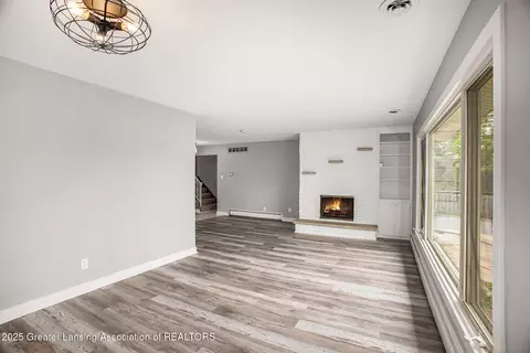 Living - 11958 Eden Trl, Eagle, MI 48822 photo 4 of 7