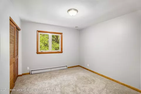 Bedroom - 11958 Eden Trl, Eagle, MI 48822 photo 2 of 3