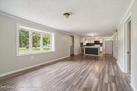 Living - 5504 Ann Dr, Bath, MI 48808 photo 2 of 2
