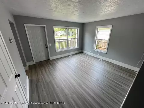 Living - 7011 Aurelius Rd, Lansing, MI 48911 photo 1 of 1