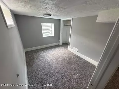 Bedroom - 7011 Aurelius Rd, Lansing, MI 48911 photo 1 of 2