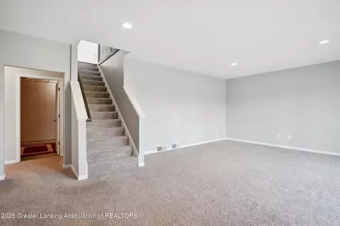 Living - 1228 Wineleaf Ln, Dewitt, MI 48820 photo 9 of 9
