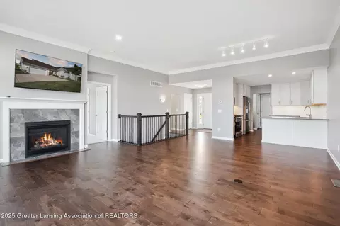 Living - 1228 Wineleaf Ln, Dewitt, MI 48820 photo 3 of 9