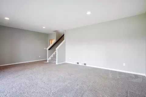Living - 1228 Wineleaf Ln, Dewitt, MI 48820 photo 8 of 9