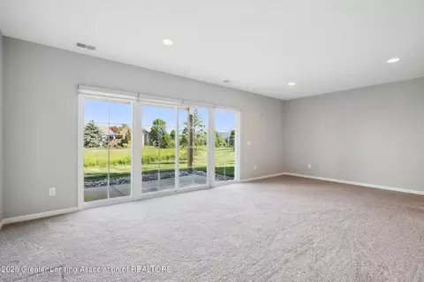 Living - 1228 Wineleaf Ln, Dewitt, MI 48820 photo 7 of 9