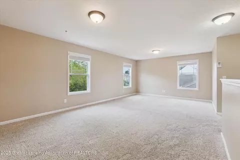 Living - 2685 Elderberry Dr, Okemos, MI 48864 photo 10 of 11