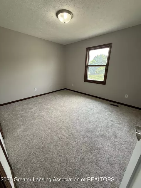 Bedroom - 1210 Wolf Run Dr, Lansing, MI 48917 photo 1 of 5
