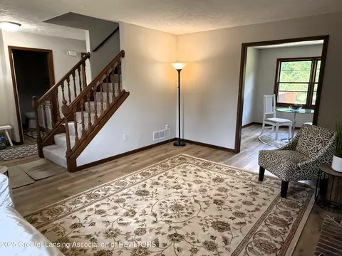 Living - 1210 Wolf Run Dr, Lansing, MI 48917 photo 2 of 2