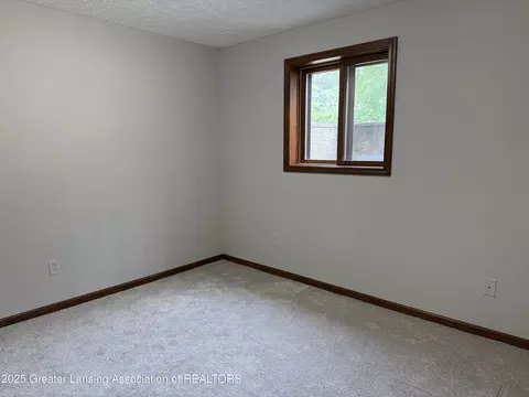 Bedroom - 1210 Wolf Run Dr, Lansing, MI 48917 photo 5 of 5