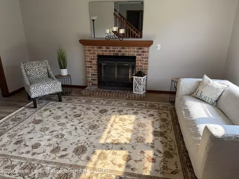 Living - 1210 Wolf Run Dr, Lansing, MI 48917 photo 1 of 2