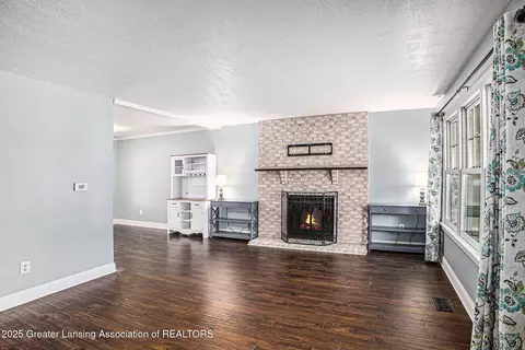 Living - 831 Eugenia Dr, Mason, MI 48854 photo 2 of 3