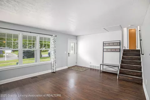 Living - 831 Eugenia Dr, Mason, MI 48854 photo 1 of 3
