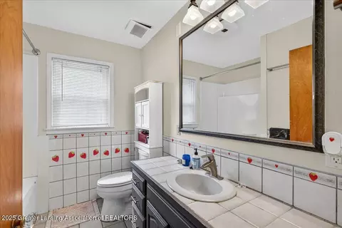 Bath - 133 E Riverside St, Williamston, MI 48895 photo 1 of 3