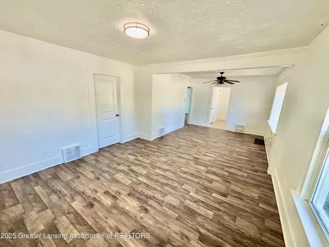 Living - 328 E Cavanaugh Rd, Lansing, MI 48910 photo 2 of 3