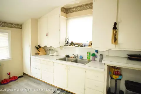Kitchen - 606 E State St, Saint Johns, MI 48879 photo 1 of 2