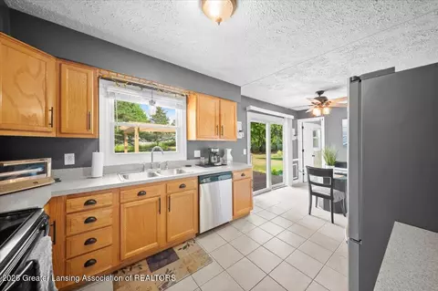 Kitchen - 1301 E Geneva Dr, Dewitt, MI 48820 photo 2 of 2