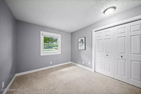 Bedroom - 1301 E Geneva Dr, Dewitt, MI 48820 photo 3 of 4