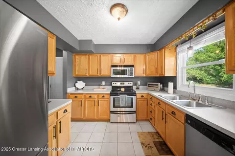 Kitchen - 1301 E Geneva Dr, Dewitt, MI 48820 photo 1 of 2
