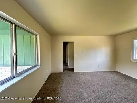 Living - 3619 Coachlight Common St, Lansing, MI 48911 photo 3 of 3