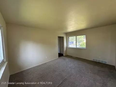Living - 3619 Coachlight Common St, Lansing, MI 48911 photo 1 of 3