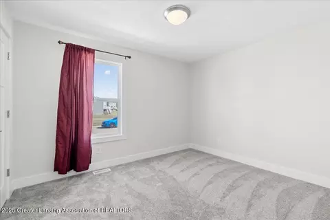 Bedroom - 6694 Castleton Dr, Grand Ledge, MI 48837 photo 3 of 3