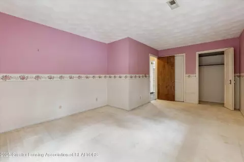 Bedroom - 15480 Boichot Rd, Lansing, MI 48906 photo 7 of 9