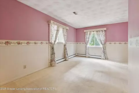 Bedroom - 15480 Boichot Rd, Lansing, MI 48906 photo 5 of 9
