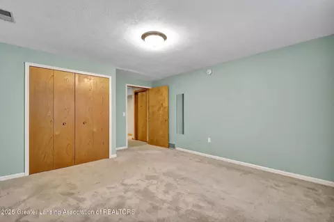 Bedroom - 12741 Ontonagon Dr, Dewitt, MI 48820 photo 7 of 7