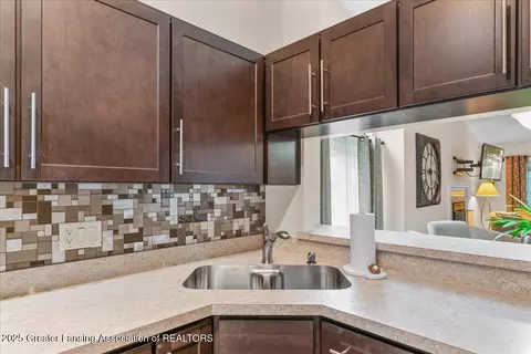Kitchen - 6923 Springtree Ln #143, Lansing, MI 48917 photo 2 of 2