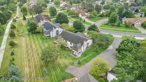 View/Area - 6923 Springtree Ln #143, Lansing, MI 48917 photo 1 of 9