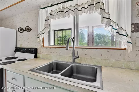Kitchen - 5091 E Vienna Rd, Clio, MI 48420 photo 2 of 2