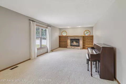Living - 410 Wanilla Ln, Dewitt, MI 48820 photo 3 of 3