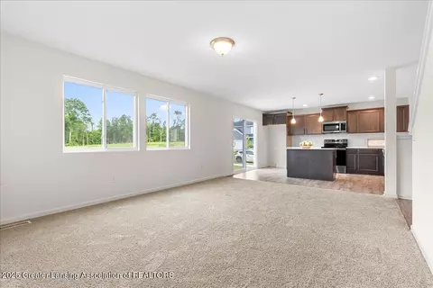 Living - 13835 Kaleidoscope Dr, Dewitt, MI 48820 photo 2 of 3