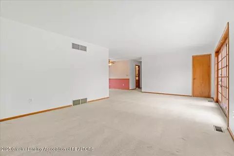 Living - 5236 Drumheller Rd, Bath, MI 48808 photo 3 of 5