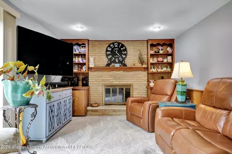 Living - 1621 E Stoll Rd, Lansing, MI 48906 photo 2 of 3
