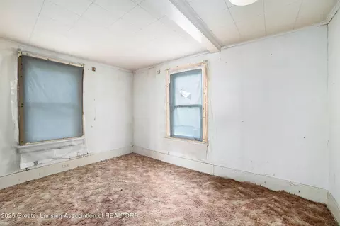 Bedroom - 611 S Wisner Rd, Ithaca, MI 48847 photo 2 of 3