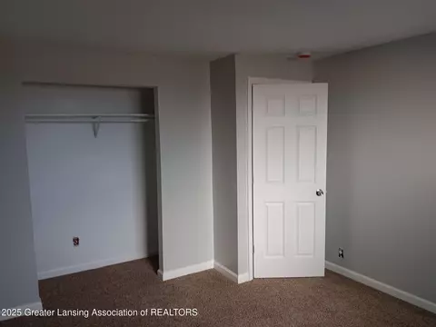 Bedroom - 413 E Hodge Ave, Lansing, MI 48910 photo 2 of 3