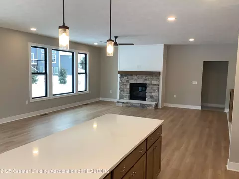 Living - 11625 Murano Dr #63, Dewitt, MI 48820 photo 1 of 1