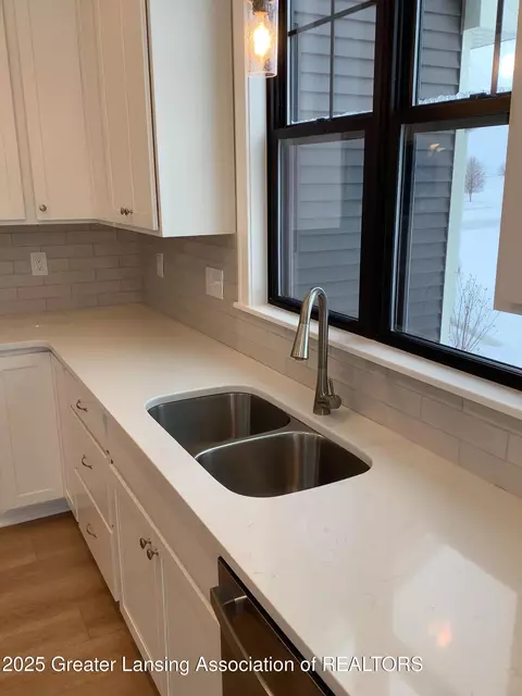Kitchen - 11625 Murano Dr #63, Dewitt, MI 48820 photo 2 of 2