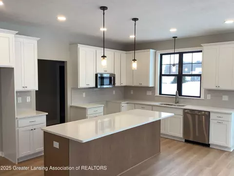 Kitchen - 11625 Murano Dr #63, Dewitt, MI 48820 photo 1 of 2