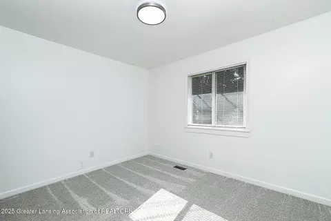 Bedroom - 361-365 N Dibble Ave, Lansing, MI 48917 photo 2 of 9