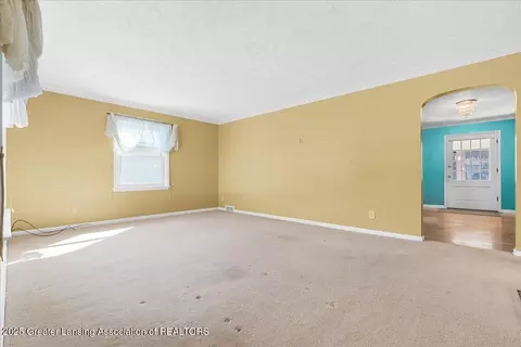 Living - 1124 Pershing Ave, Lansing, MI 48910 photo 1 of 4