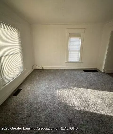Living - 1011 N Chestnut St, Lansing, MI 48906 photo 1 of 2