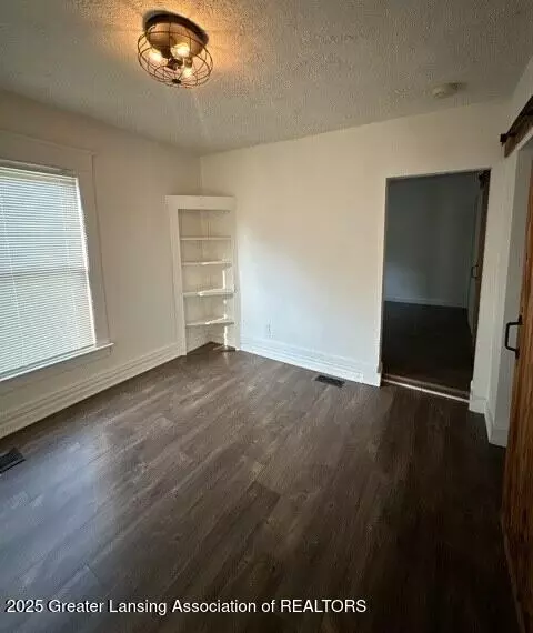 Living - 1011 N Chestnut St, Lansing, MI 48906 photo 2 of 2